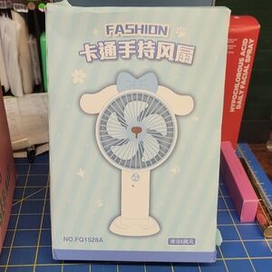 Portable Handheld Fan with Bow Design Blue New in Box